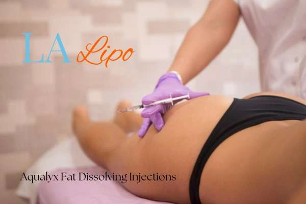 Woman having fat dissolving injections Kington on thighs