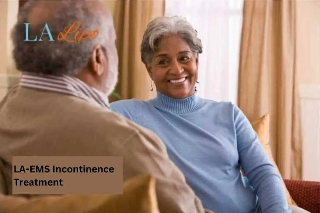 Couple sat smiling at each other - LA-EMS treatment Kington